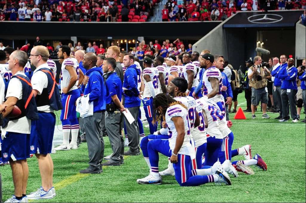 ATLANTA, GA - OCTOBER 01: Buffalo Bills players kneel during the national anthem prior to the game against the Atlanta Falcons at Mercedes-Benz Stadium on October 1, 2017 in Atlanta, Georgia. (Photo by Scott Cunningham/Getty Images)